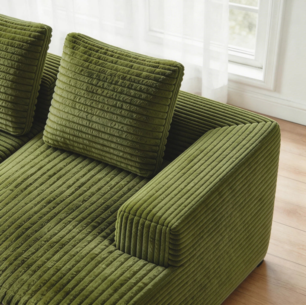 Divano modulare a L con chaise longue in velluto a coste verde
