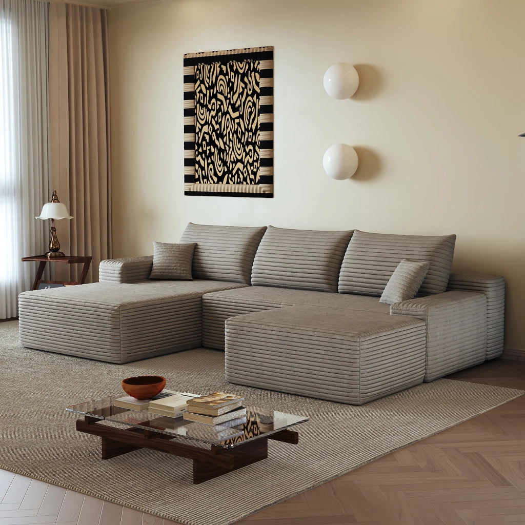 Divano angolare modulare con chaise longue e seduta profonda, imbottito in tessuto a coste color cammello