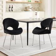 Sedia da pranzo in velluto nero con struttura in metallo, schienale curvo e design senza braccioli