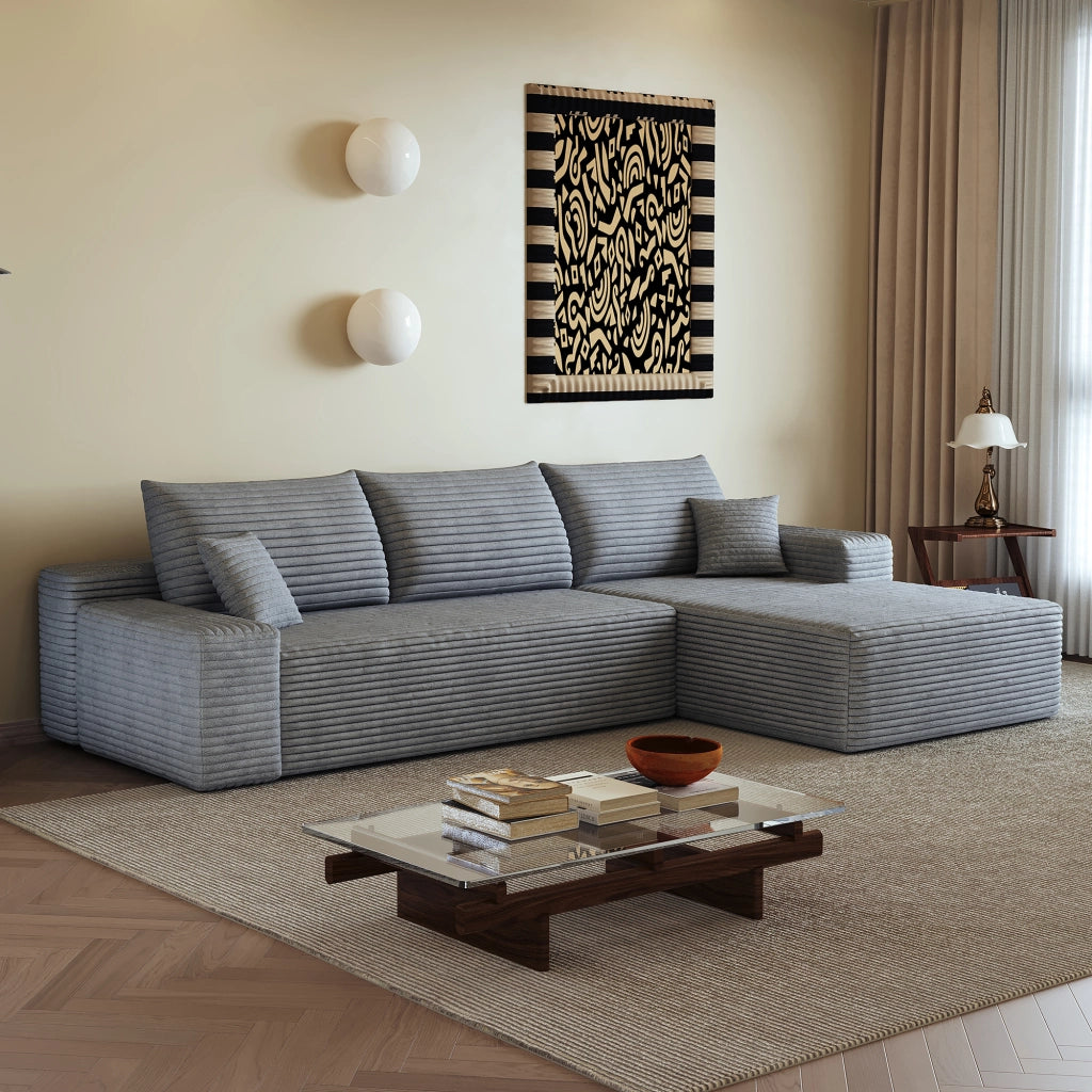 Divano angolare modulare con chaise longue e seduta profonda, senza montaggio, in tessuto a coste grigio
