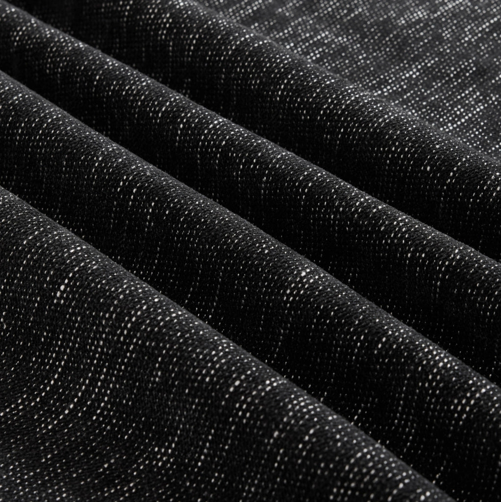 Pouf Windsor in tessuto chenille nero con design versatile