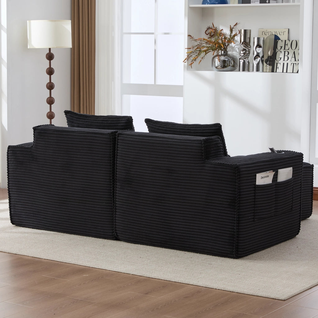 Divano modulare 2 posti con 2 pouf; portabicchieri e tasche laterali; in tessuto a coste nero
