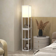 Lampada da terra bianca in MDF con 3 ripiani, interruttore a pedale e porte USB
