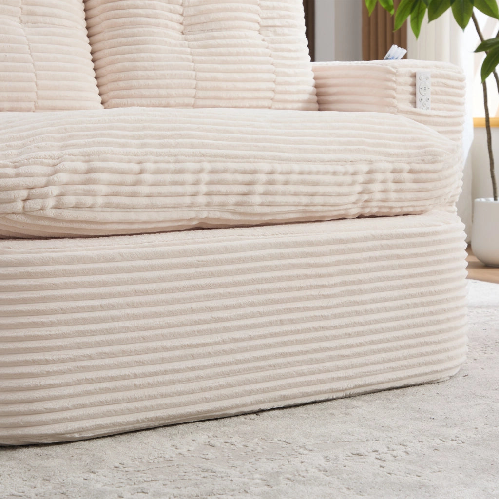 Poltrona letto 2 in 1 in velluto a coste beige; schienale alto; seduta extra profonda e portabevande