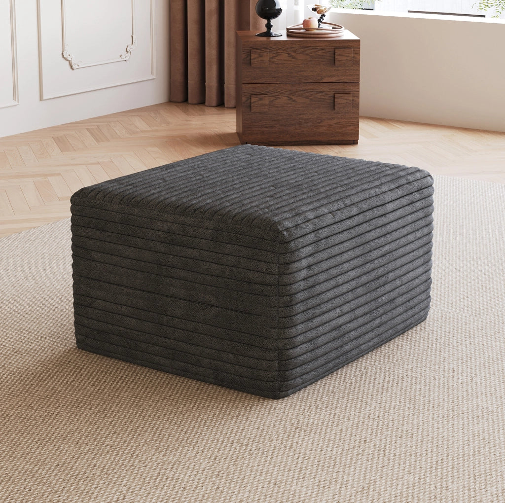 Pouf imbottito in velluto a coste grigio scuro