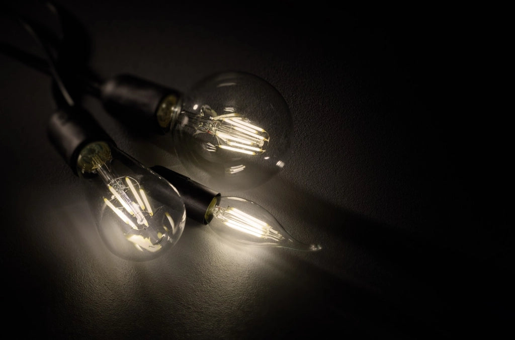 Lampadina LED fiamma E14 trasparente 2700K Trio