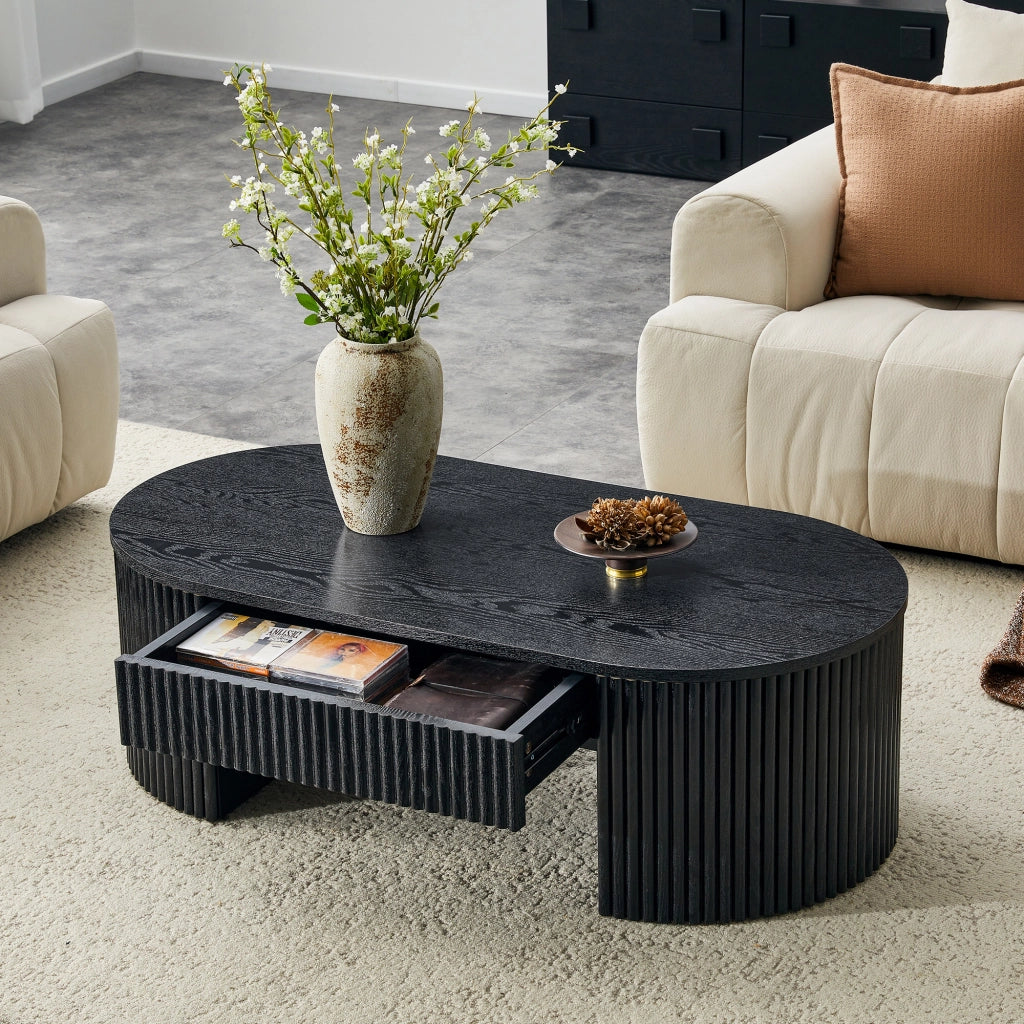 Tavolino basso fisso ovale con cassetto estraibile; rivestimento scanalato effetto legno nero in MDF per soggiorno