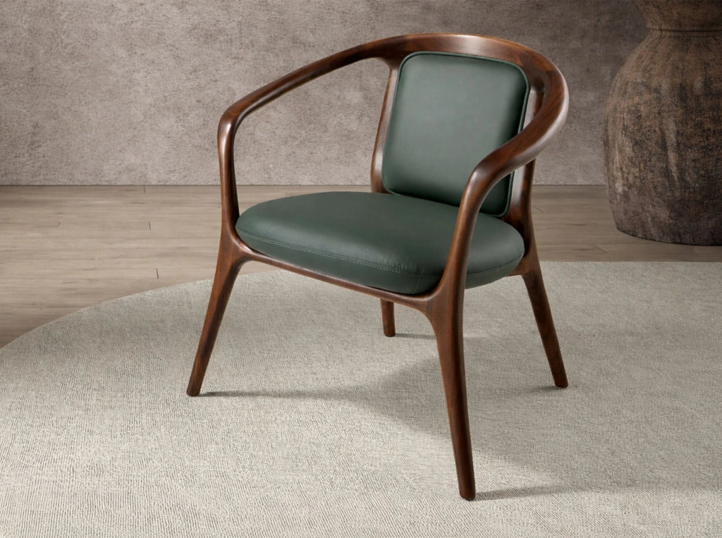 Poltrona in similpelle verde scuro