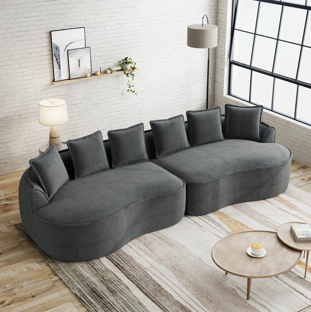 Divano modulare quattro posti in tessuto chenille grigio, senza struttura, dimensioni extra large con chaiselongue profonda e cuscini inclusi