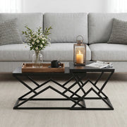 Tavolino basso fisso geometrico con struttura incrociata in ferro e piano in pannello di particelle nero 80 × 50 × 40 cm