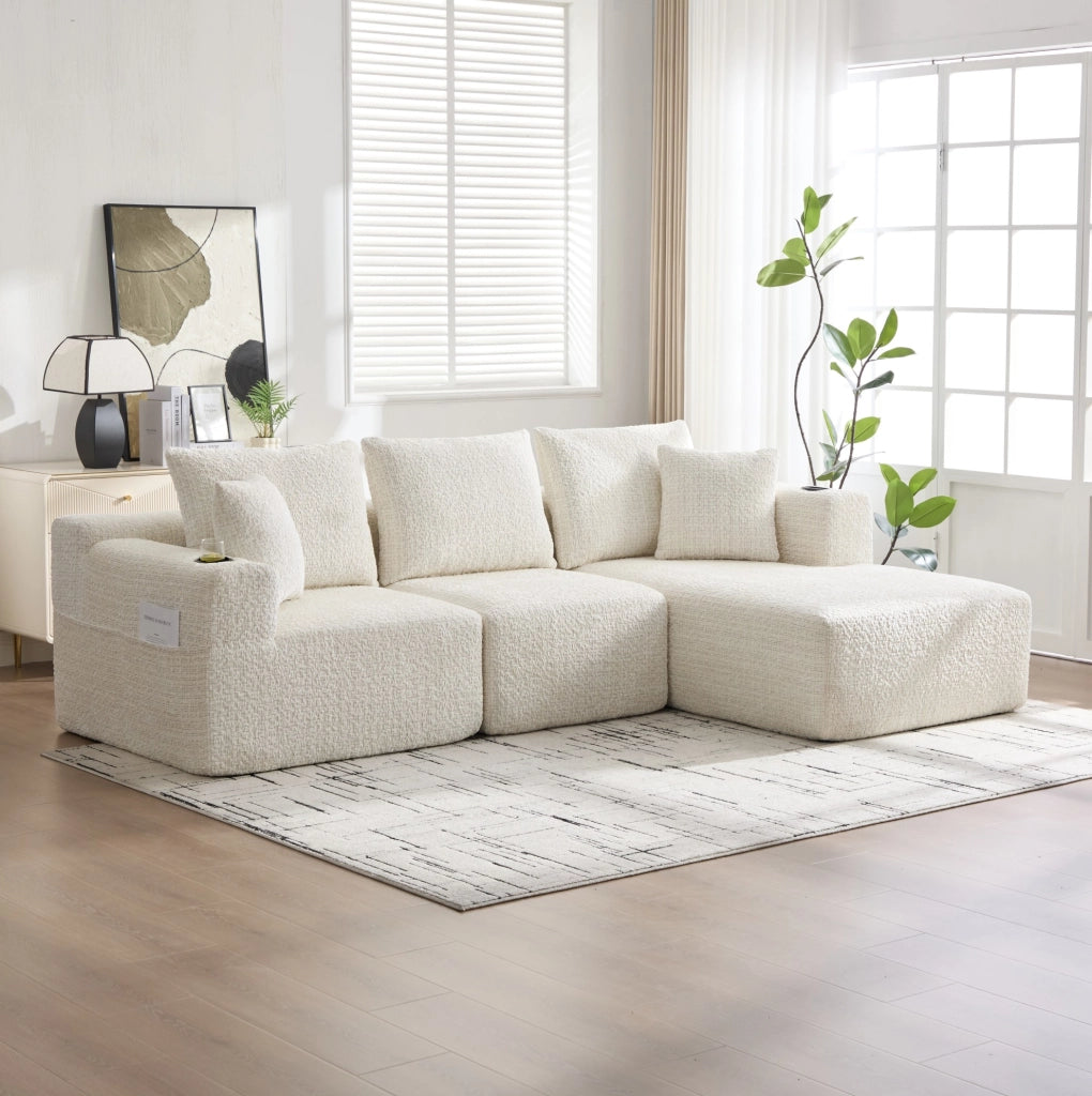 Divano angolare modulare in ciniglia beige con tasche laterali HOMVRA
