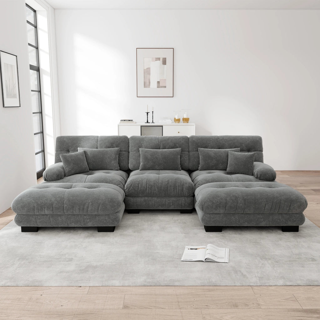 Divano componibile modulare a U in chenille grigio con ottomane mobili e cuscini per il salotto