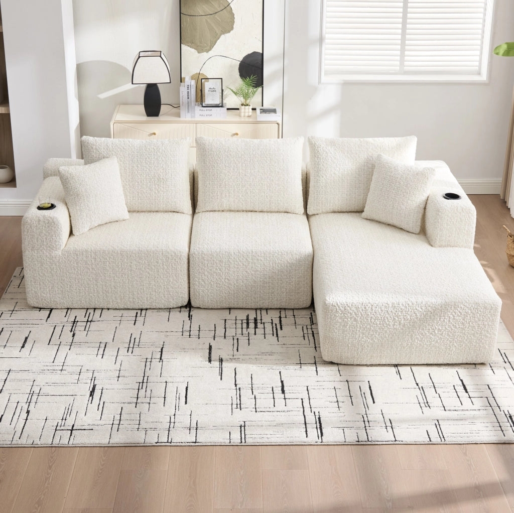 Divano angolare modulare in ciniglia beige con tasche laterali HOMVRA