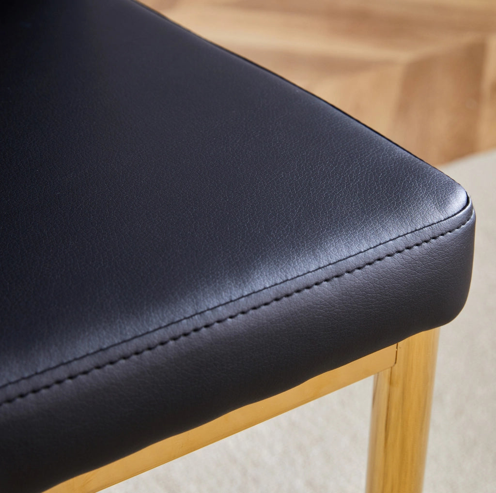 Set di 4 sedie da sala da pranzo 43 x 42,5 x 92,5 cm in similpelle nera e oro