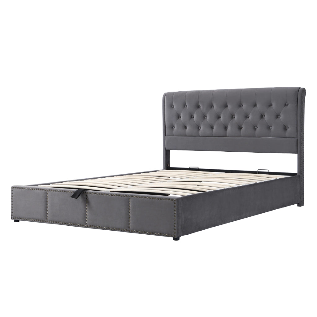 Letto contenitore in velluto grigio 180 x 200 cm; apertura idraulica; rete a doghe e testiera imbottita con borchie