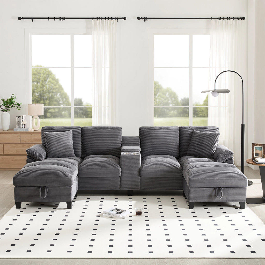 Divano a forma di U 4 sedili 293 x 142 x 93 cm; cassettiera porta - tazze; porte 2 USB; cuscini; velluto a coste; grigio