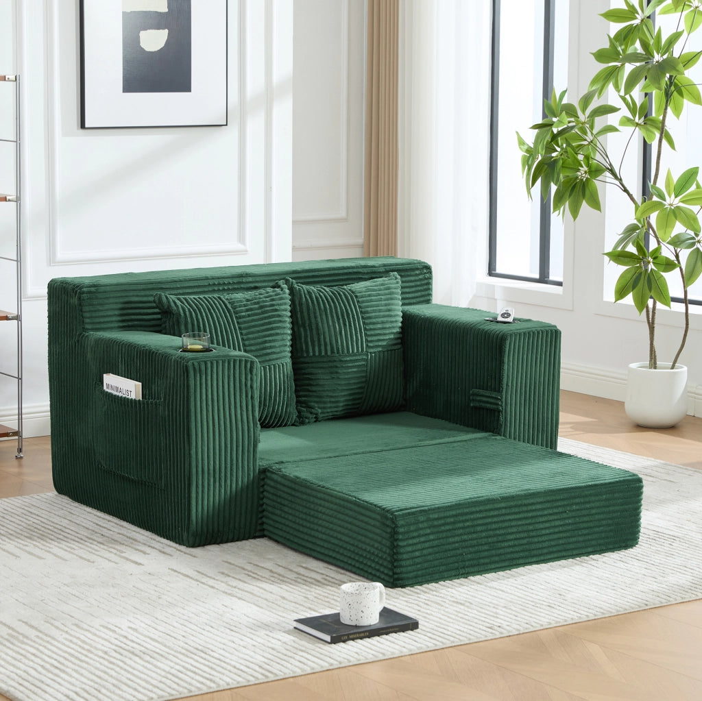 Pouf divano in velluto a coste verde smeraldo con tasche laterali; 151 x 133 x 64 cm