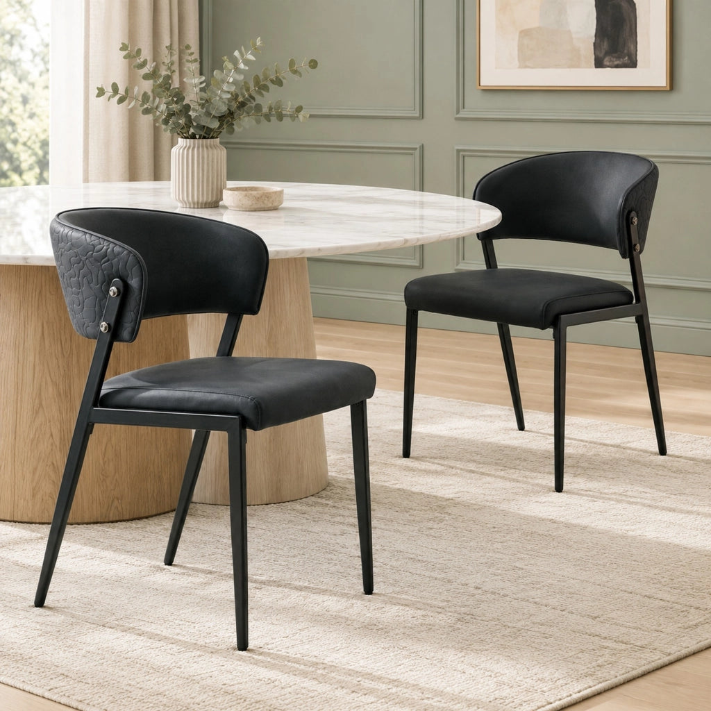 Coppia di sedie da pranzo imbottite nere con struttura in metallo e schienale ergonomico