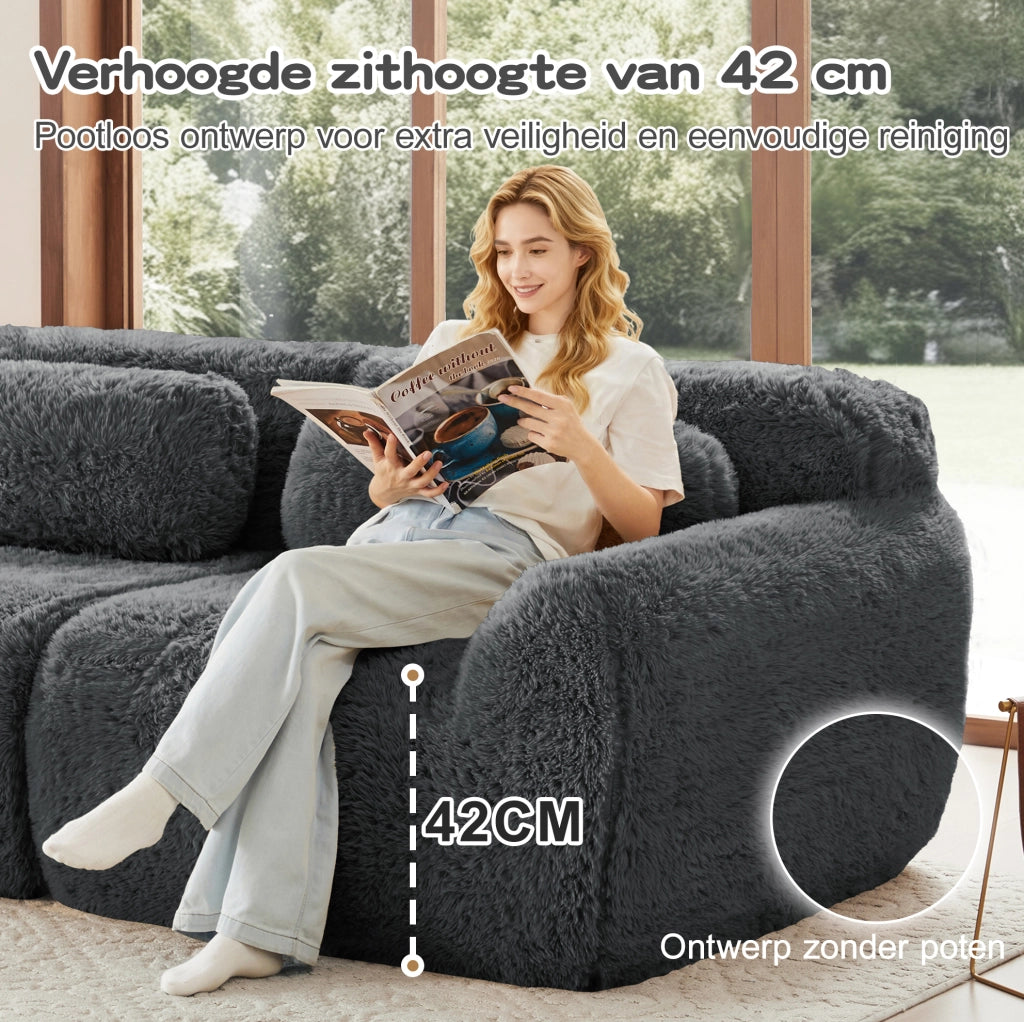 Divano angolare modulare a L a 4 posti in tessuto plush grigio con cuscini e chaise longue