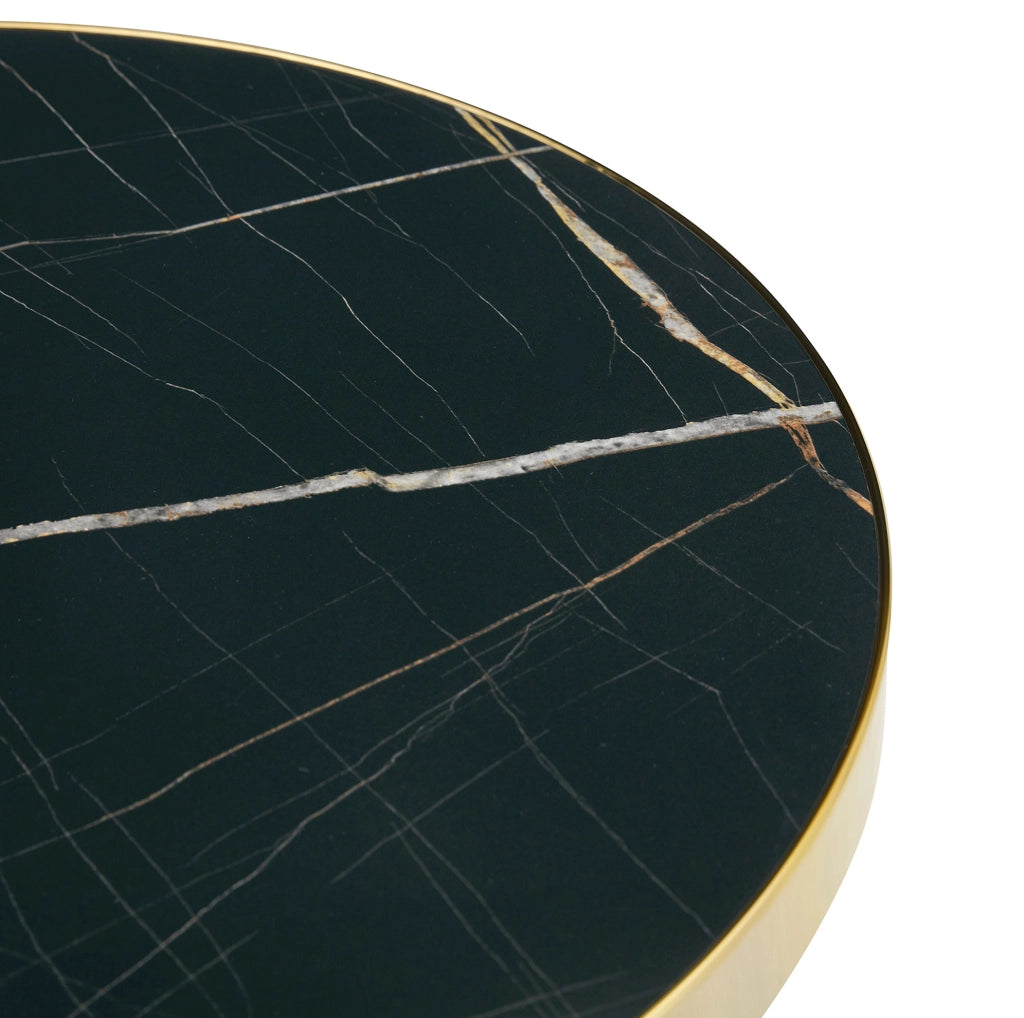 Tavolino da salotto rotondo effetto marmo nero e oro in MDF HOMVRA