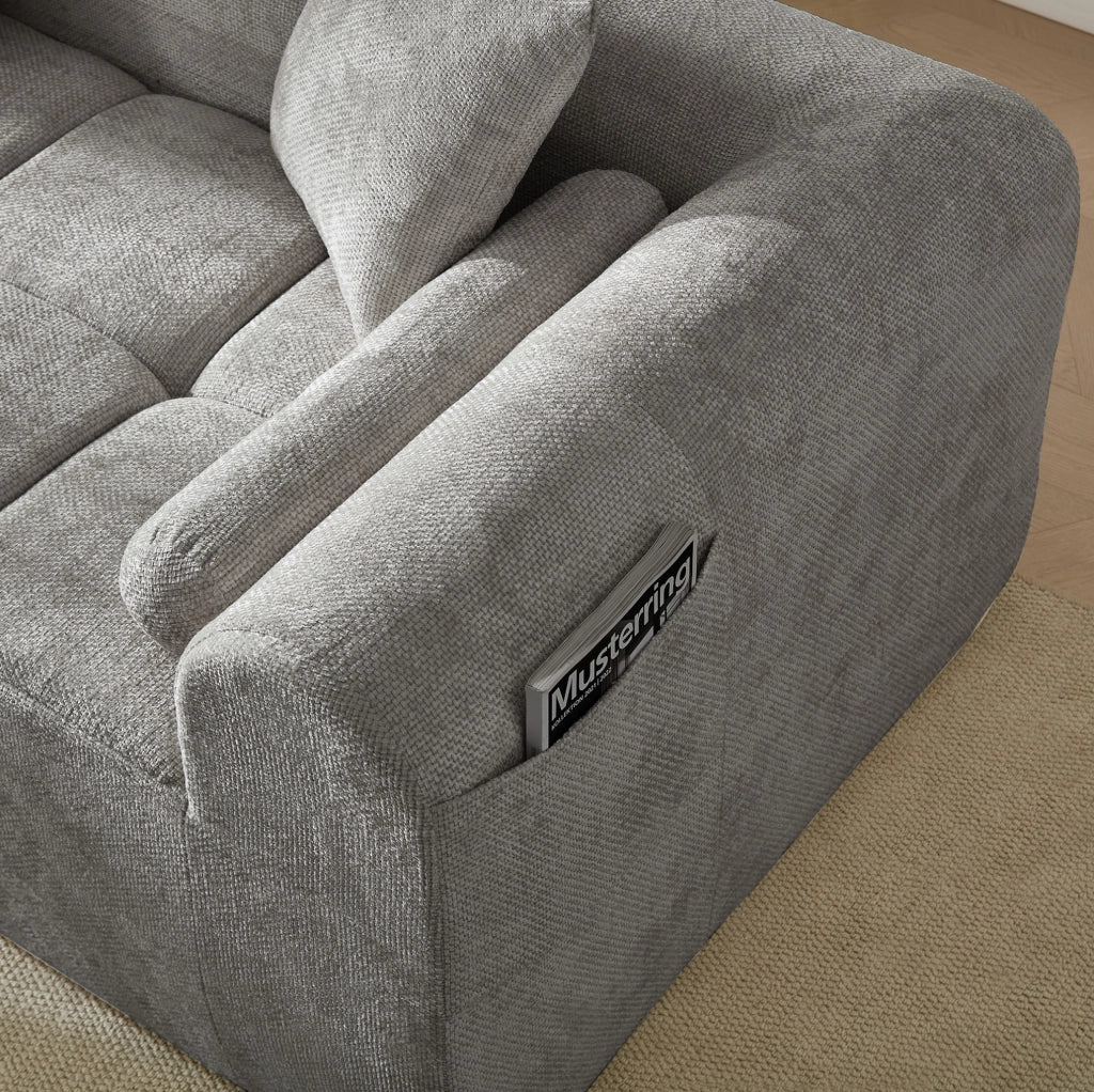 Divano angolare in tessuto chenille grigio chiaro 263 cm con schienale ergonomico e tasca laterale porta riviste