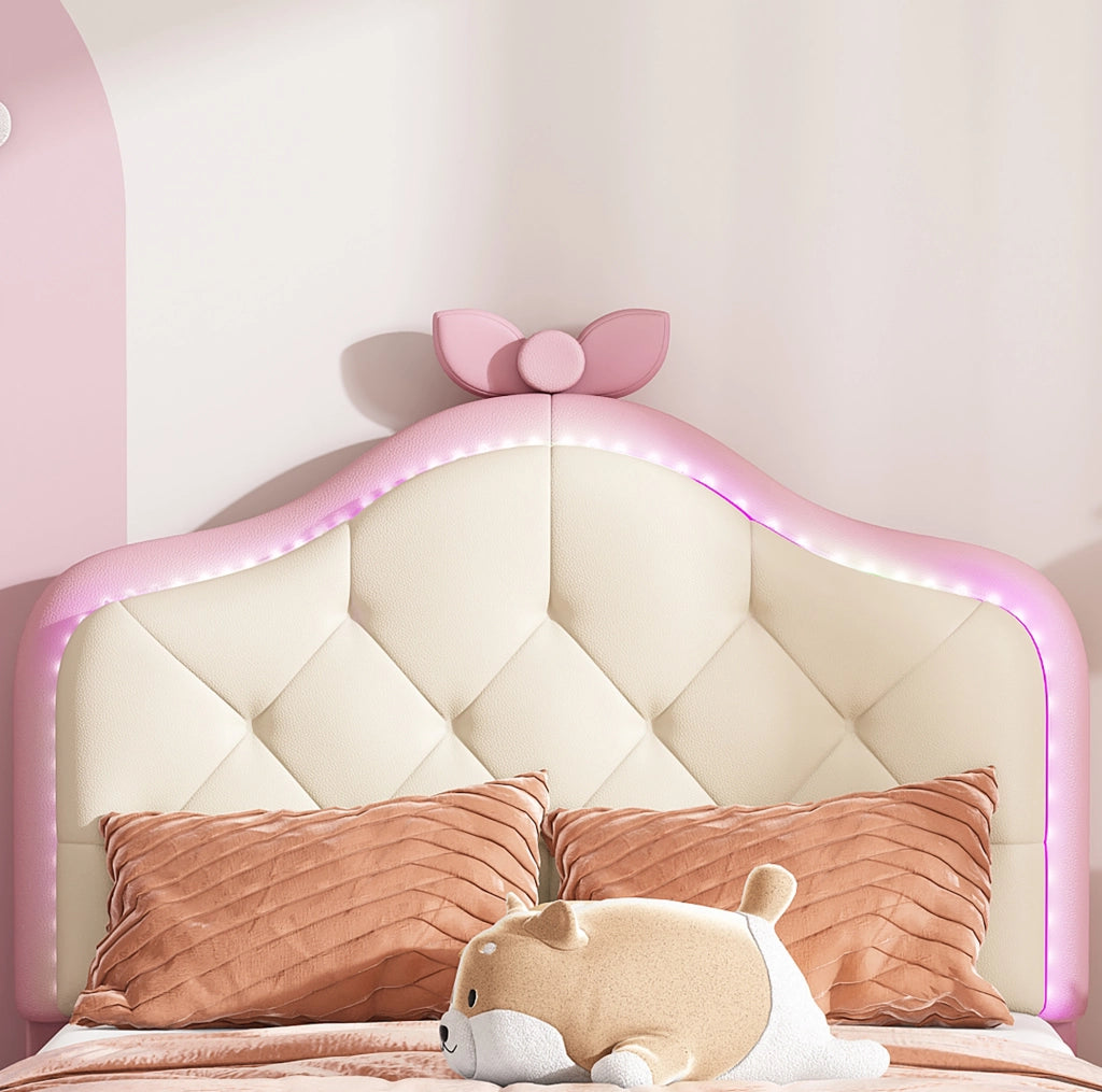 Letto singolo imbottito in PU rosa con strisce LED multicolore e testiera a onde 90x200 cm