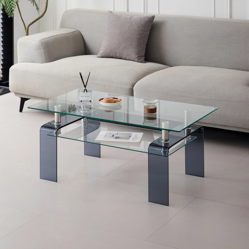 Tavolino basso fisso a due ripiani in vetro temperato trasparente con gambe grigie per soggiorno 100 × 55 × 45 cm