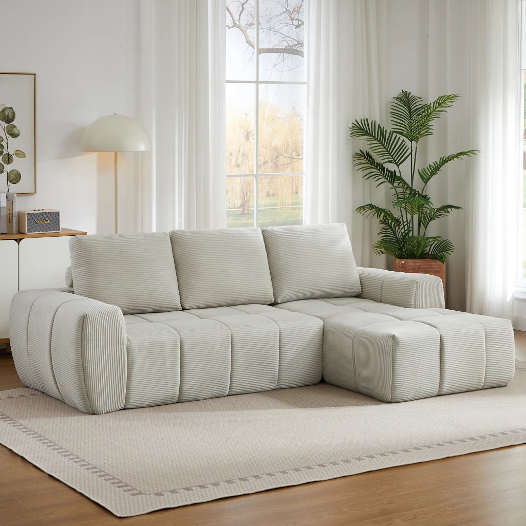 Divano angolare modulare con cuscini rimovibili e seduta imbottita, design segmentato in velluto a coste beige