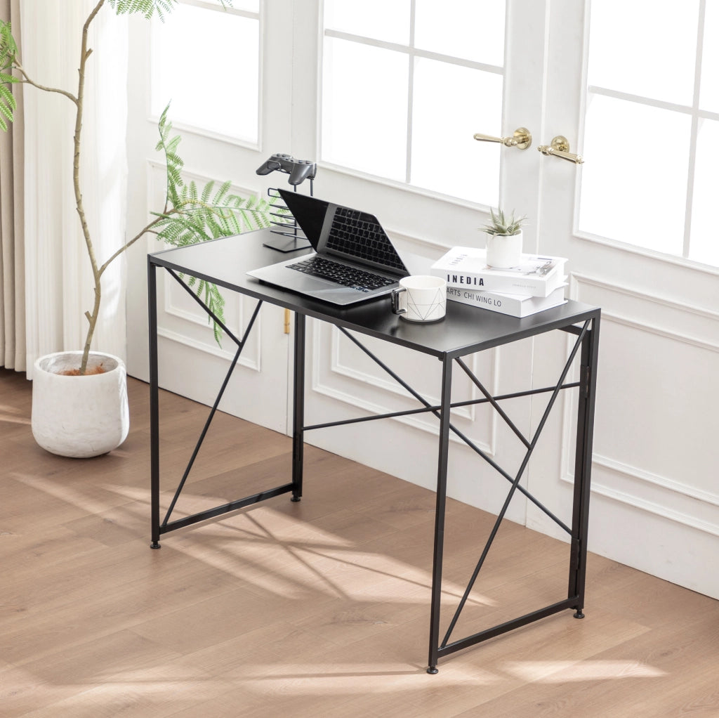 Scrivania pieghevole nera in MDF 99x50x75 cm per spazi piccoli