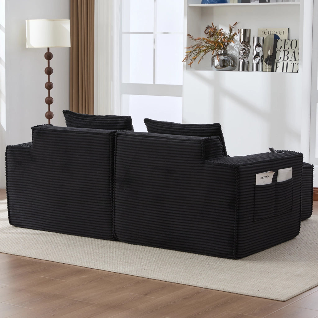 Divano modulare in velluto a coste nero con 2 pouf e portabevande