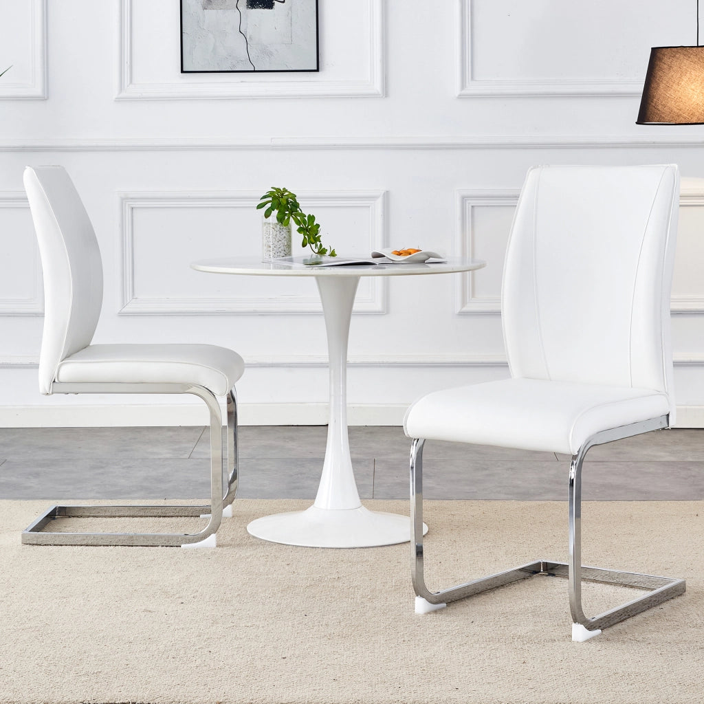 Set di 2 sedie da pranzo in ecopelle bianca con gambe in metallo argentato