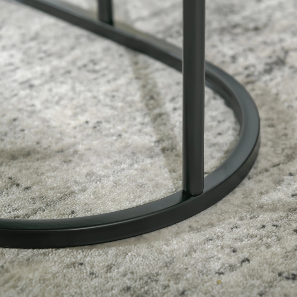 Set di 2 tavolini da caffè rotondo e ovale impilabili in MDF e acciaio effetto marmo colore nero