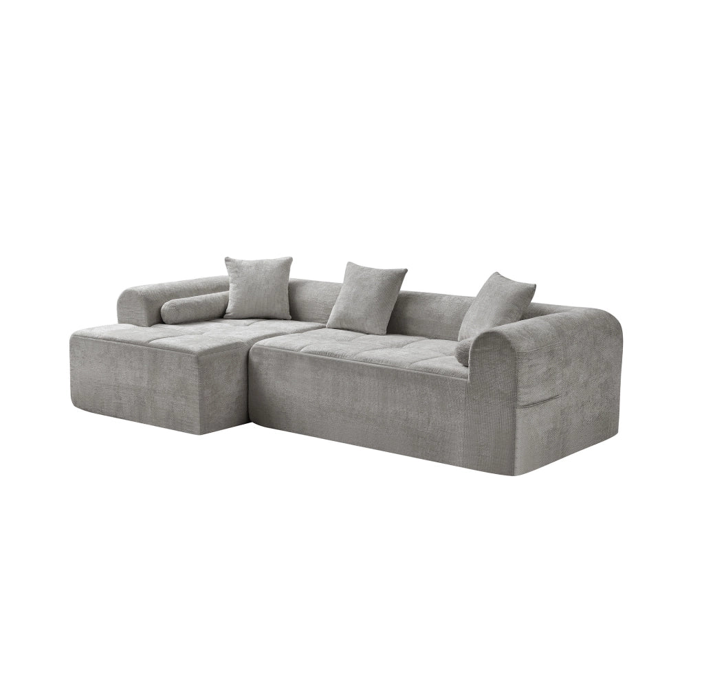 Divano angolare in tessuto chenille grigio chiaro 263 cm con schienale ergonomico e tasca laterale porta riviste