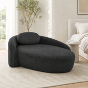 Divano compatto dal design arrotondato in tessuto teddy nero con cuscino