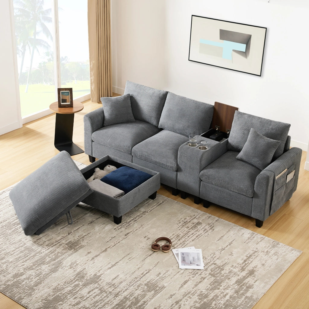 Divano angolare modulare 4 posti in velluto a coste grigio con pouf contenitore console USB e 2 portabevande