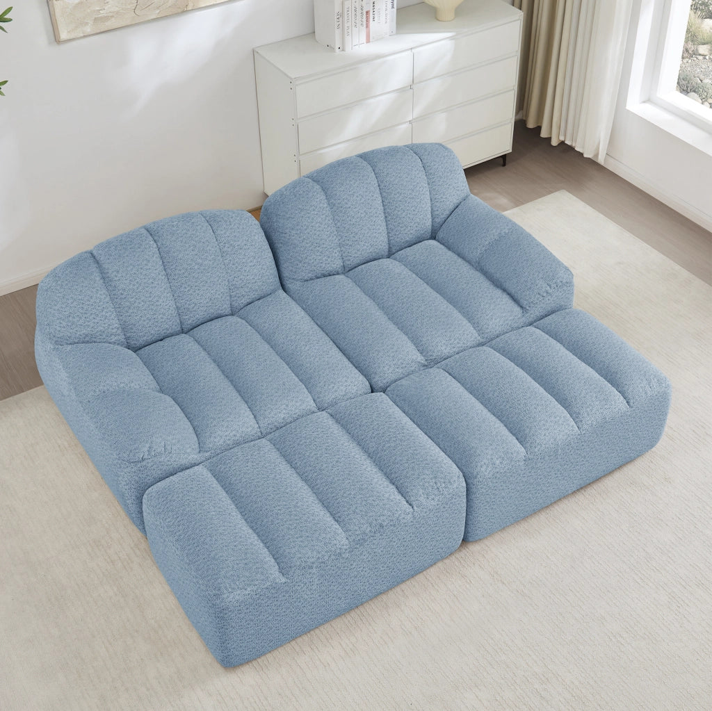 Divano modulare a 2 posti con ottomani in pile granulato blu