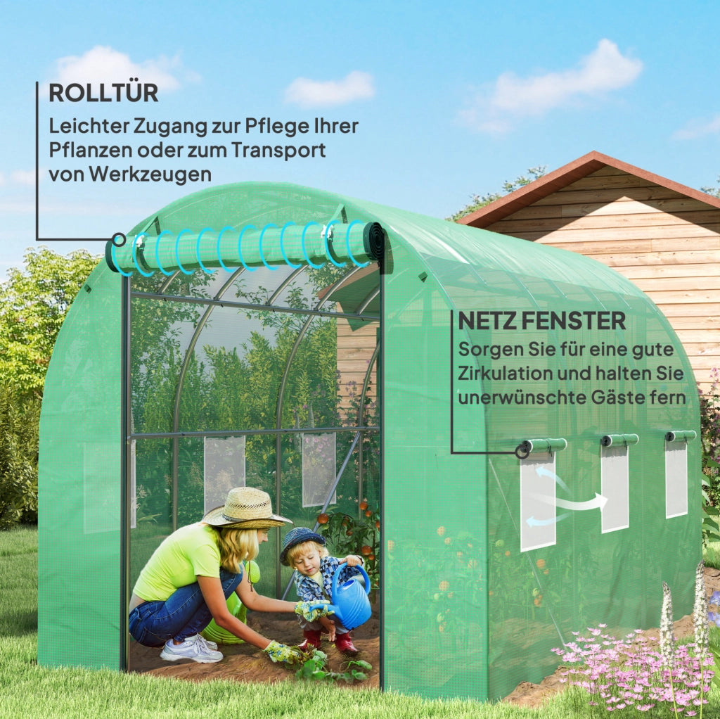 Serra a tunnel in plastica verde con porte e finestre avvolgibili