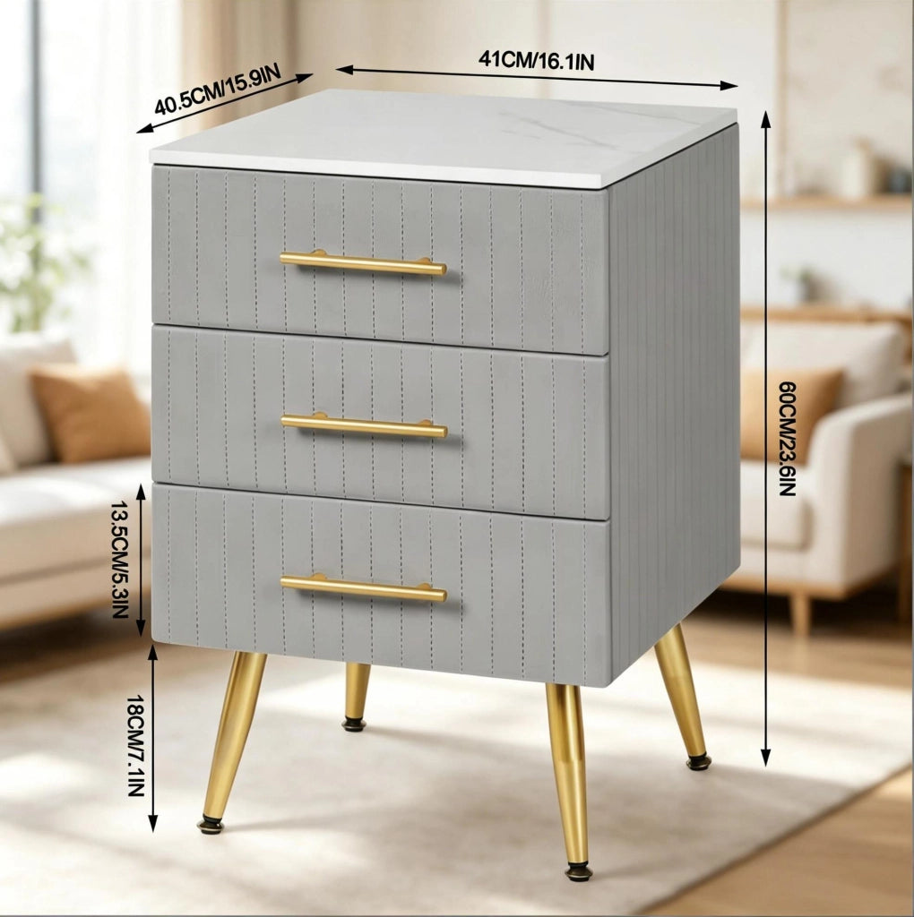 Comodino grigio con 3 cassetti, rivestimento in velluto e gambe in metallo