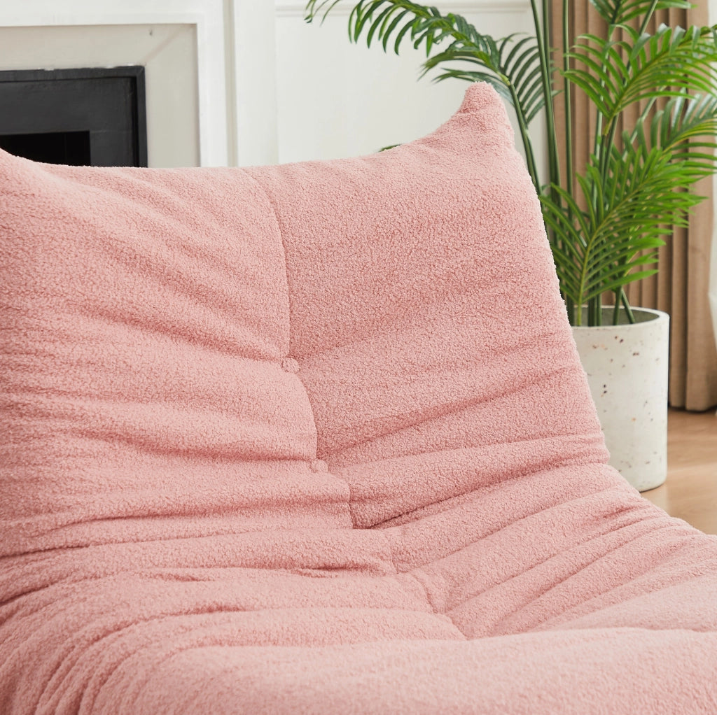 Poltrona da pavimento ULEVR 115 cm in tessuto teddy rosa, imbottitura in schiuma elastica e design con bottoni