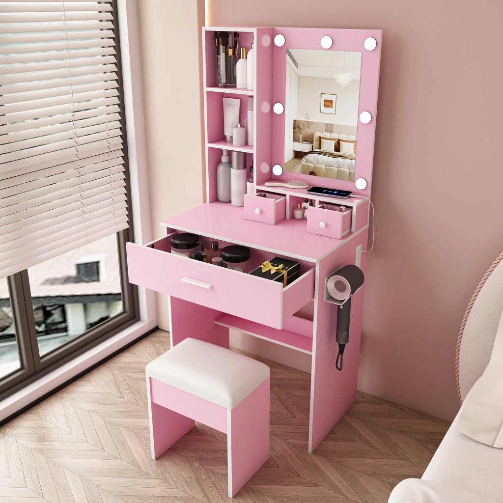 Toeletta rosa con specchio LED a 3 tonalità; presa integrata; supporto asciugacapelli; cassetti e sgabello imbottito in MDF