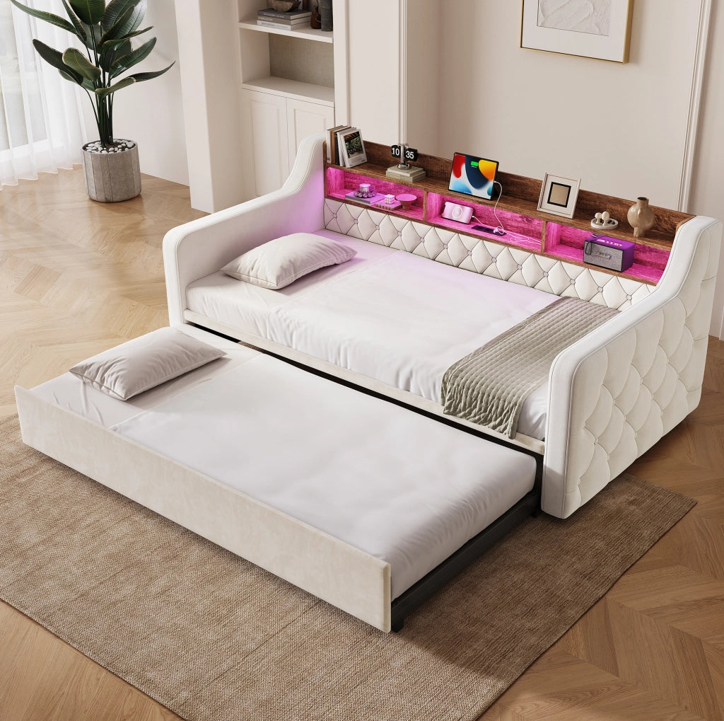 Divano letto 90x190 cm in velluto beige con contenitore in legno, illuminazione LED, prese USB e Type-C, rete a doghe e braccioli