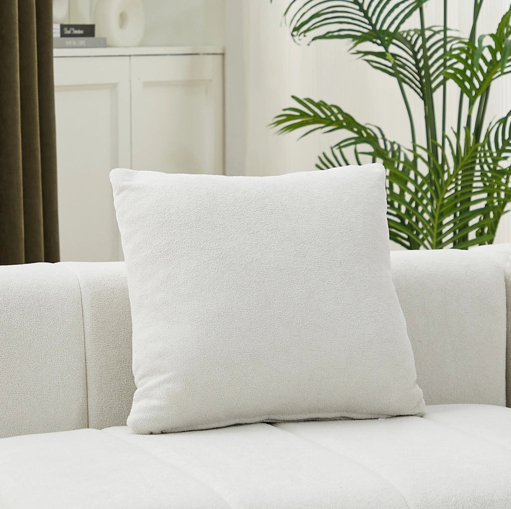 Divano modulare curvo in chenille beige con 2 cuscini