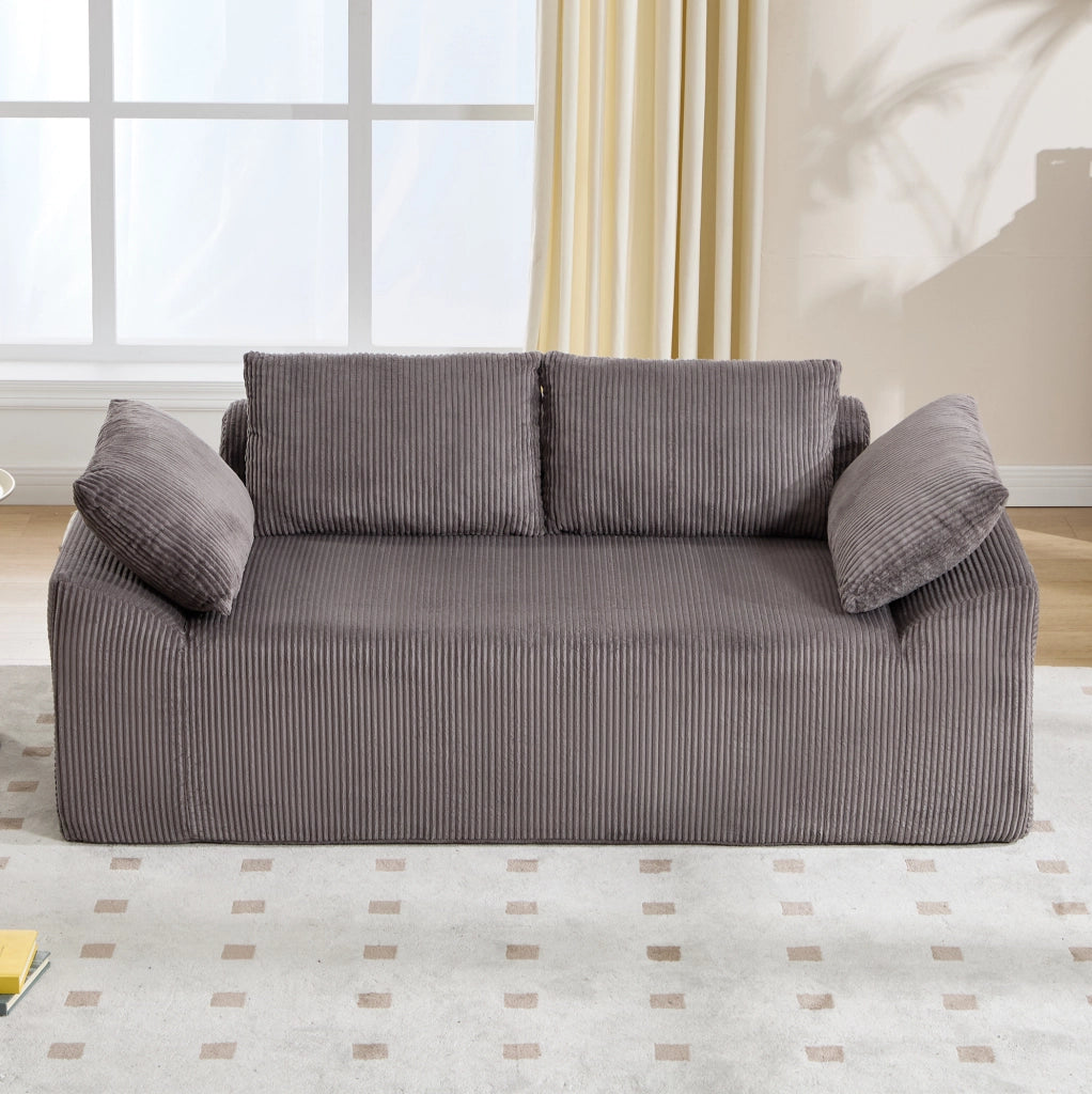 Divano compatto in tessuto con schiuma memory e design senza struttura rigida
