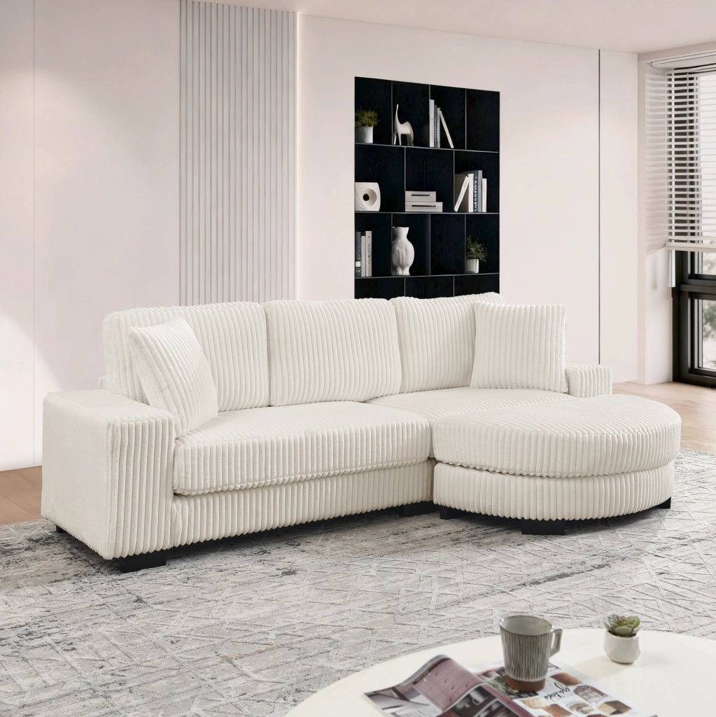 Divano angolare a L 4 posti in velluto a costine beige con pouf ovale modulare e 2 cuscini