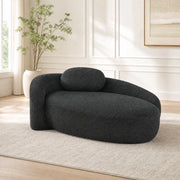 Divano minimalista in tessuto Teddy nero, compatto e confortevole