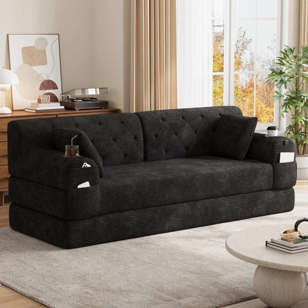 Divano letto 3 posti con rivestimento in velluto a coste, schienale alto, struttura in metallo, 2 portabicchieri e 4 tasche laterali, nero