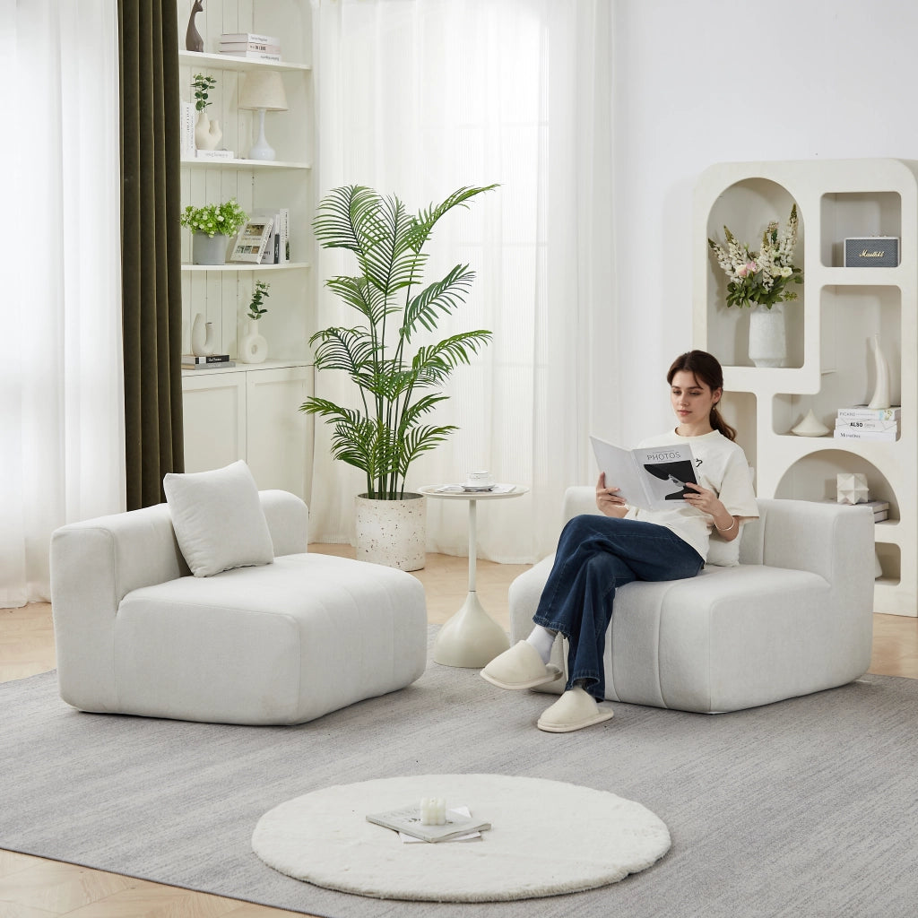 Divano modulare curvo con due cuscini, design a tasti di pianoforte, rivestimento in ciniglia beige