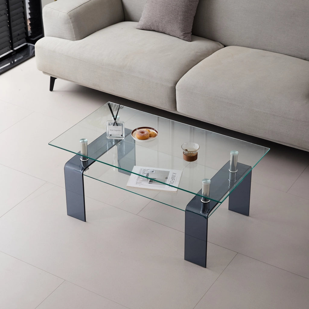 Tavolino basso fisso a due ripiani in vetro temperato trasparente con gambe grigie per soggiorno 100 × 55 × 45 cm