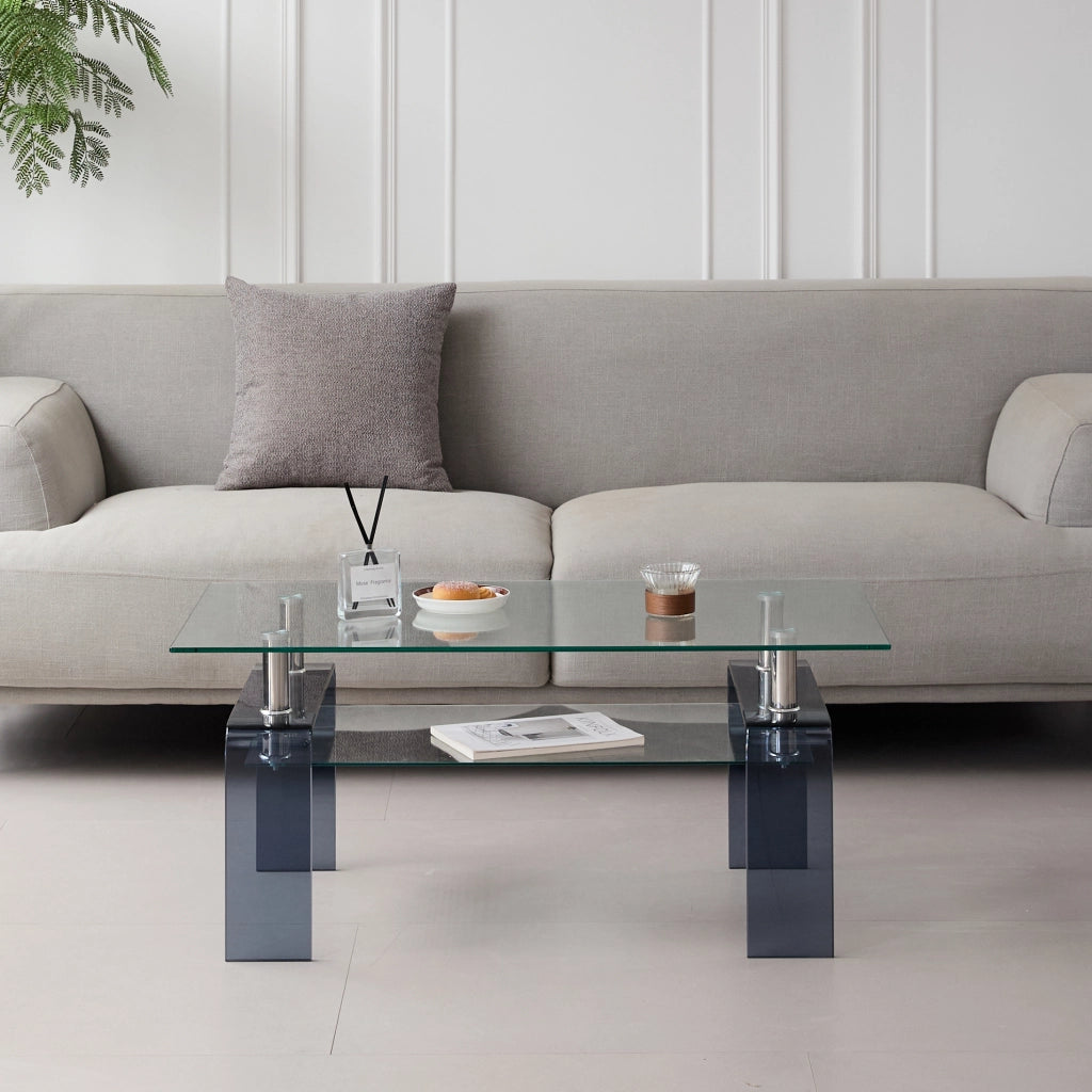 Tavolino basso fisso a due ripiani in vetro temperato trasparente con gambe grigie per soggiorno 100 × 55 × 45 cm