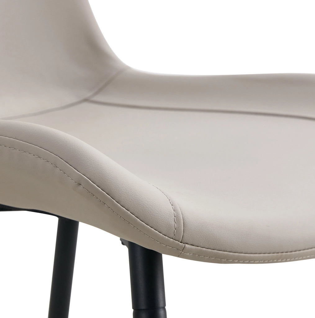 Set tavolo da pranzo rotondo Ø100 cm con 4 sedie in PU grigio caldo HOMVRA